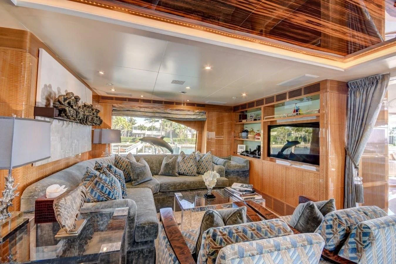 a living room with a large window aboard GROOVER Yacht for Sale