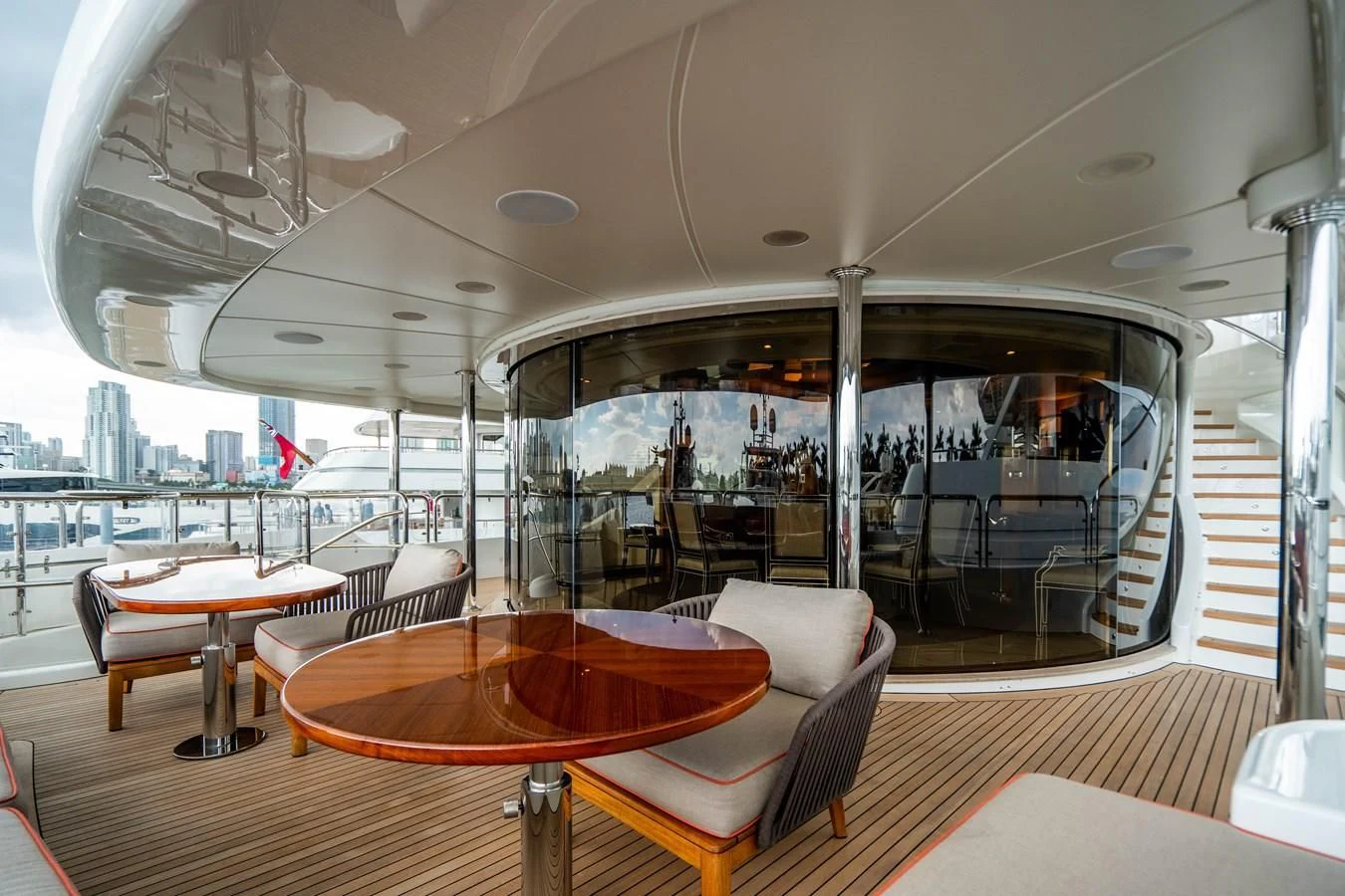 a room with a table and chairs aboard GROOVER Yacht for Sale