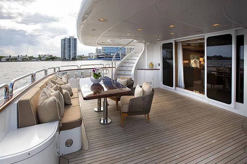 a large balcony overlooking a beach aboard GROOVER Yacht for Sale