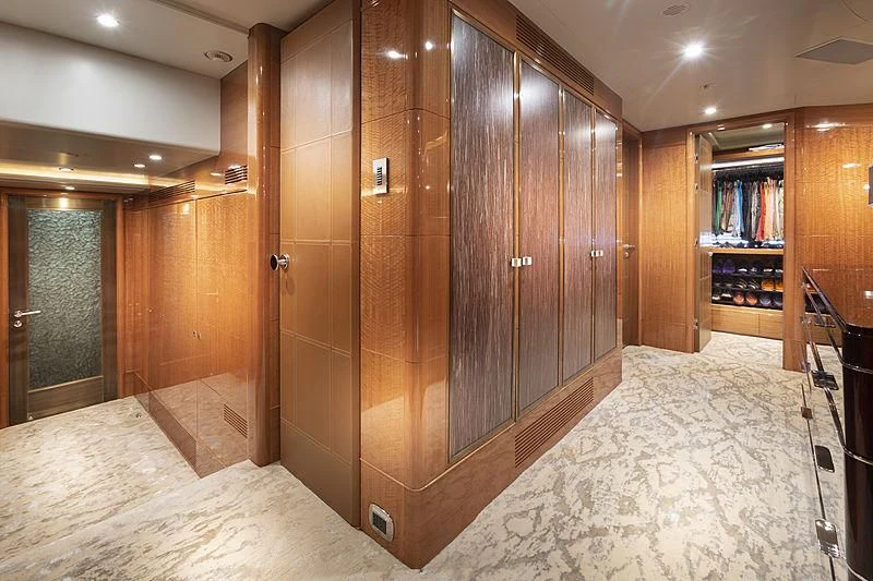 a large wooden closet in a room aboard GROOVER Yacht for Sale