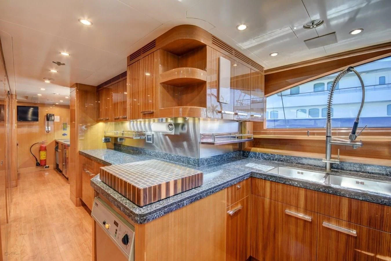 a kitchen with a large island aboard GROOVER Yacht for Sale