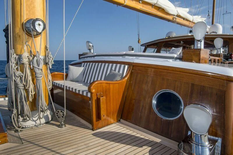 a boat with a large wooden boat aboard SEA PRINCE Yacht for Sale