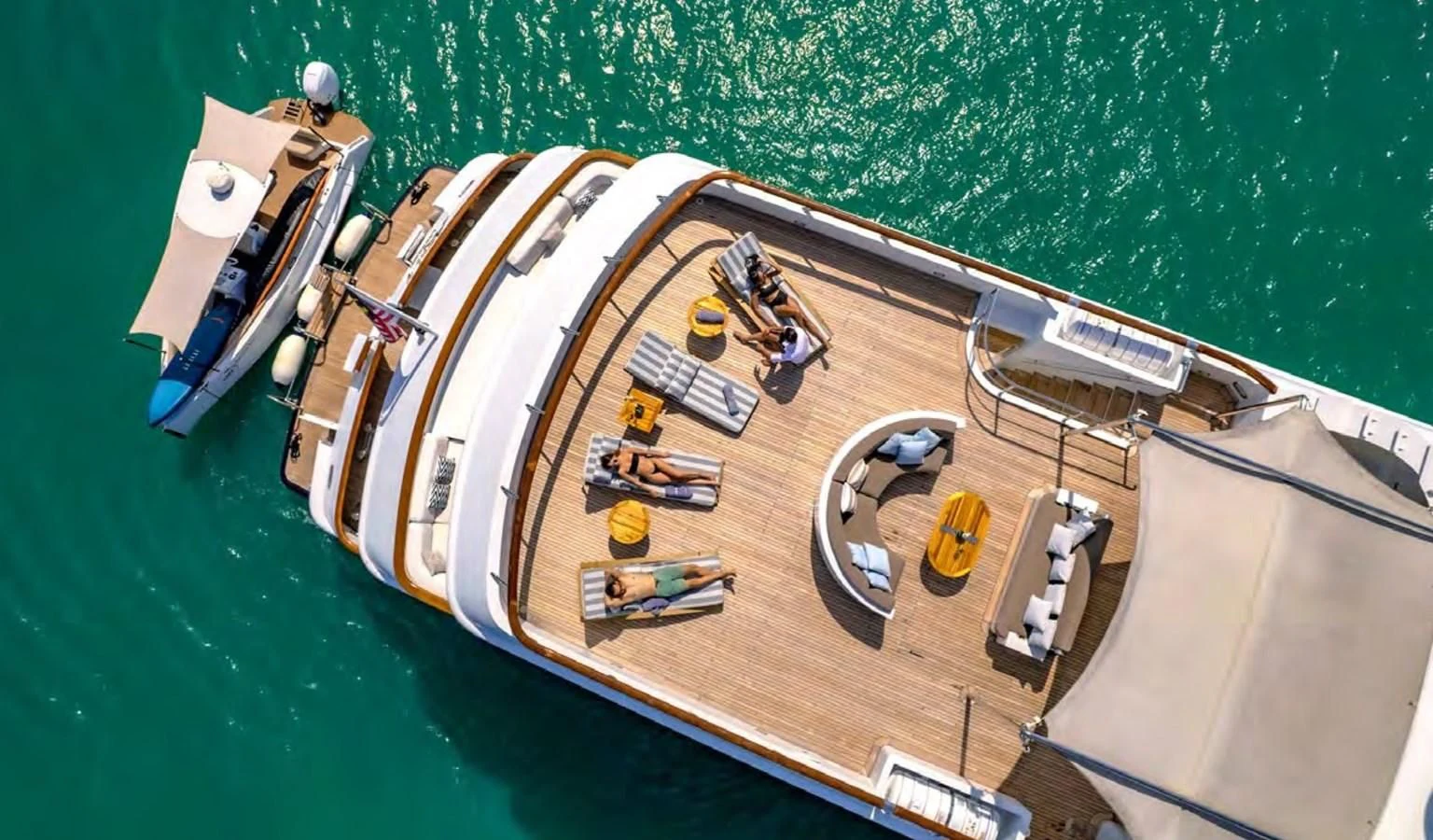 a wooden model of a ship aboard AZUL V Yacht for Charter