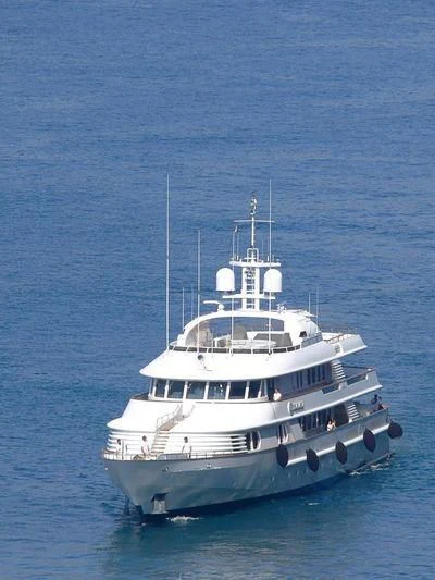 a large white boat in the water aboard AZUL V Yacht for Charter