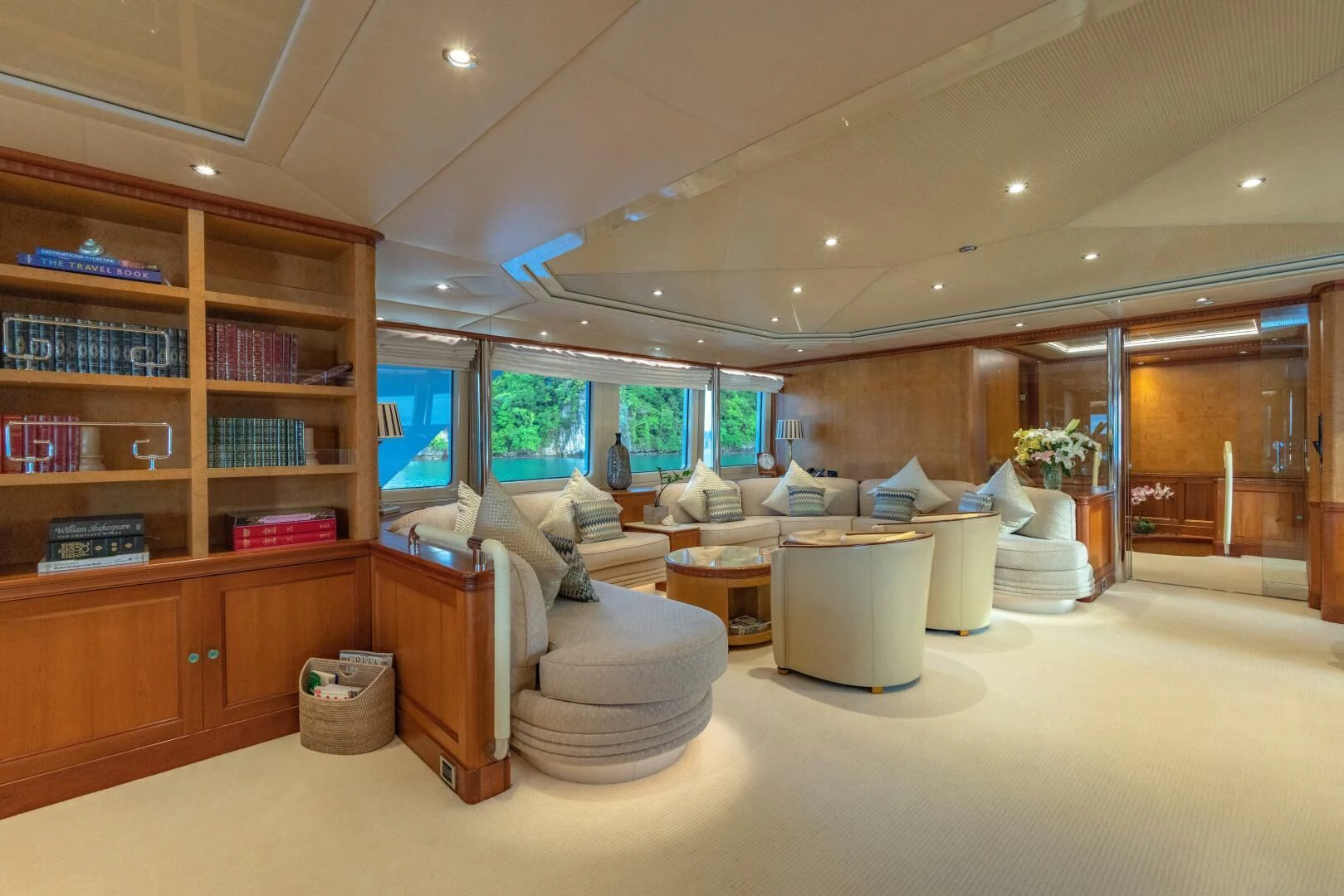a room with a couch and a table aboard AZUL V Yacht for Charter