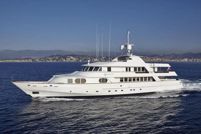 a large white boat in the water aboard AZUL V Yacht for Charter