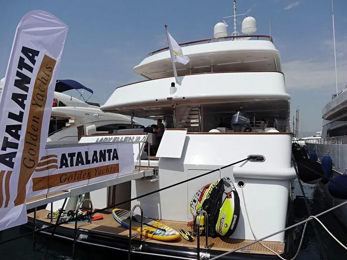 a boat with a surfboard on it aboard AZUL V Yacht for Charter