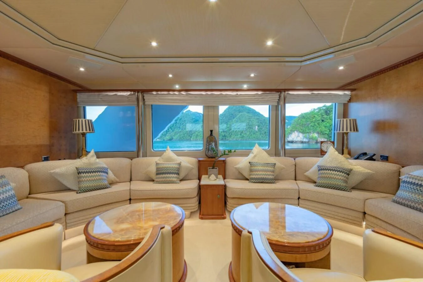a living room with a large window aboard AZUL V Yacht for Charter