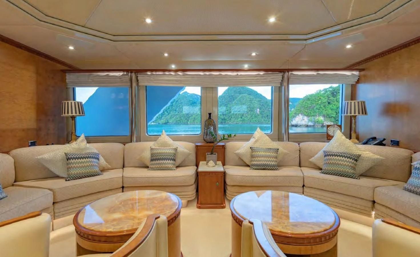 a living room with a large window aboard AZUL V Yacht for Charter