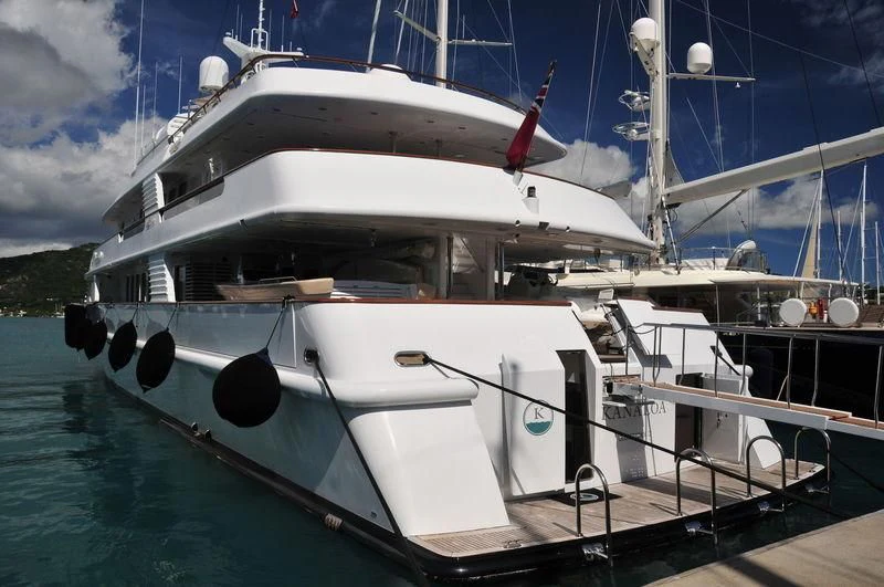 a white boat on the water aboard AZUL V Yacht for Charter