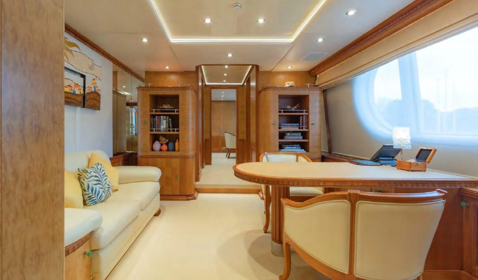 a living room with a table and chairs aboard AZUL V Yacht for Charter