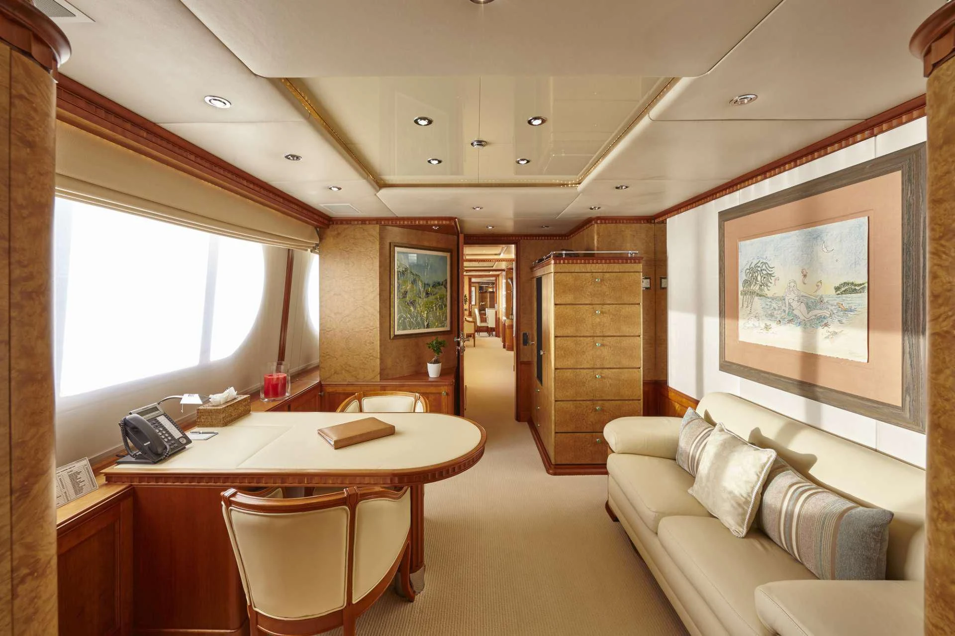 a room with a couch and a table aboard AZUL V Yacht for Charter