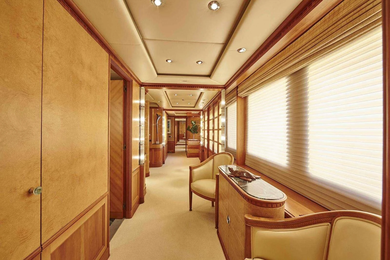 a room with a table and chairs aboard AZUL V Yacht for Charter