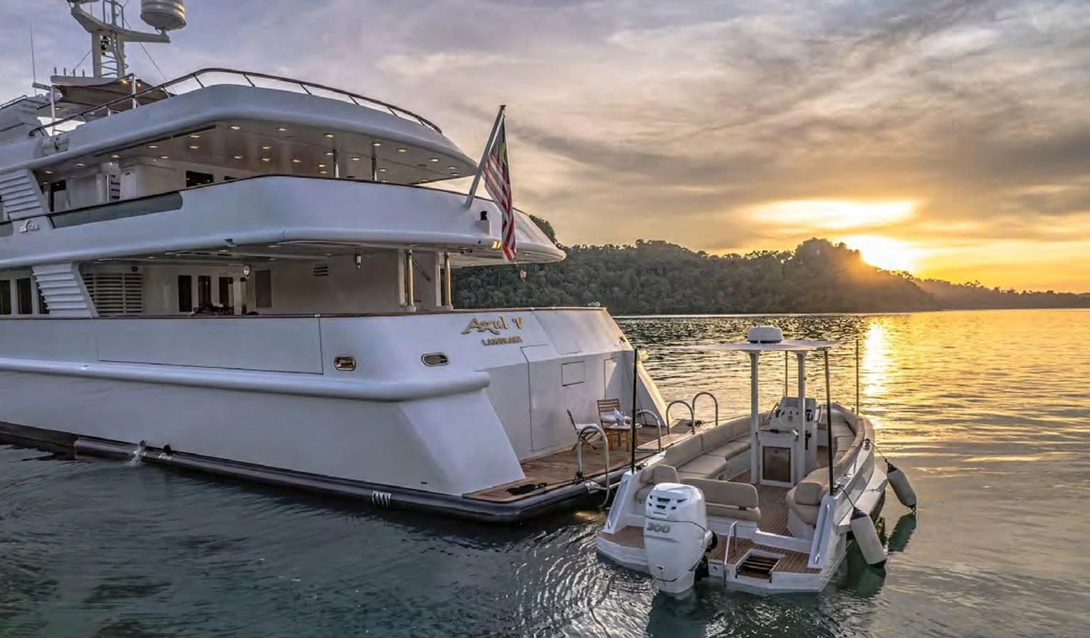 a boat docked at a dock aboard AZUL V Yacht for Charter