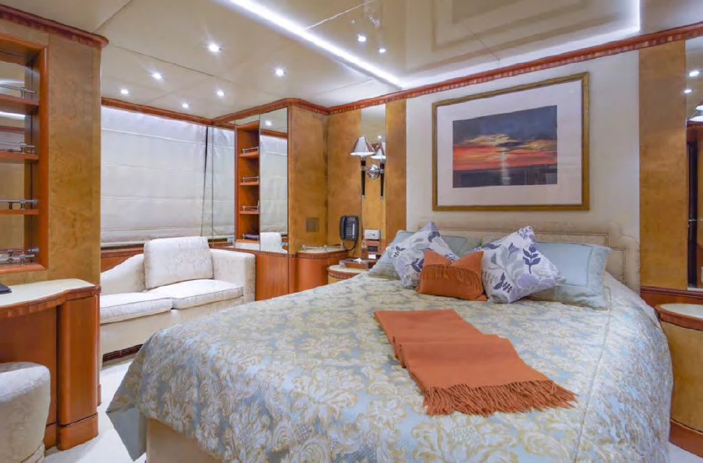 a large bed in a room aboard AZUL V Yacht for Charter