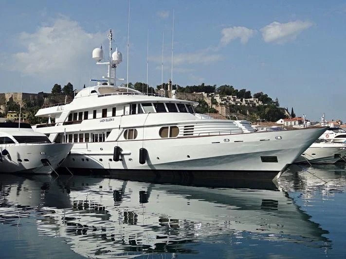 a group of boats in a harbor aboard AZUL V Yacht for Charter