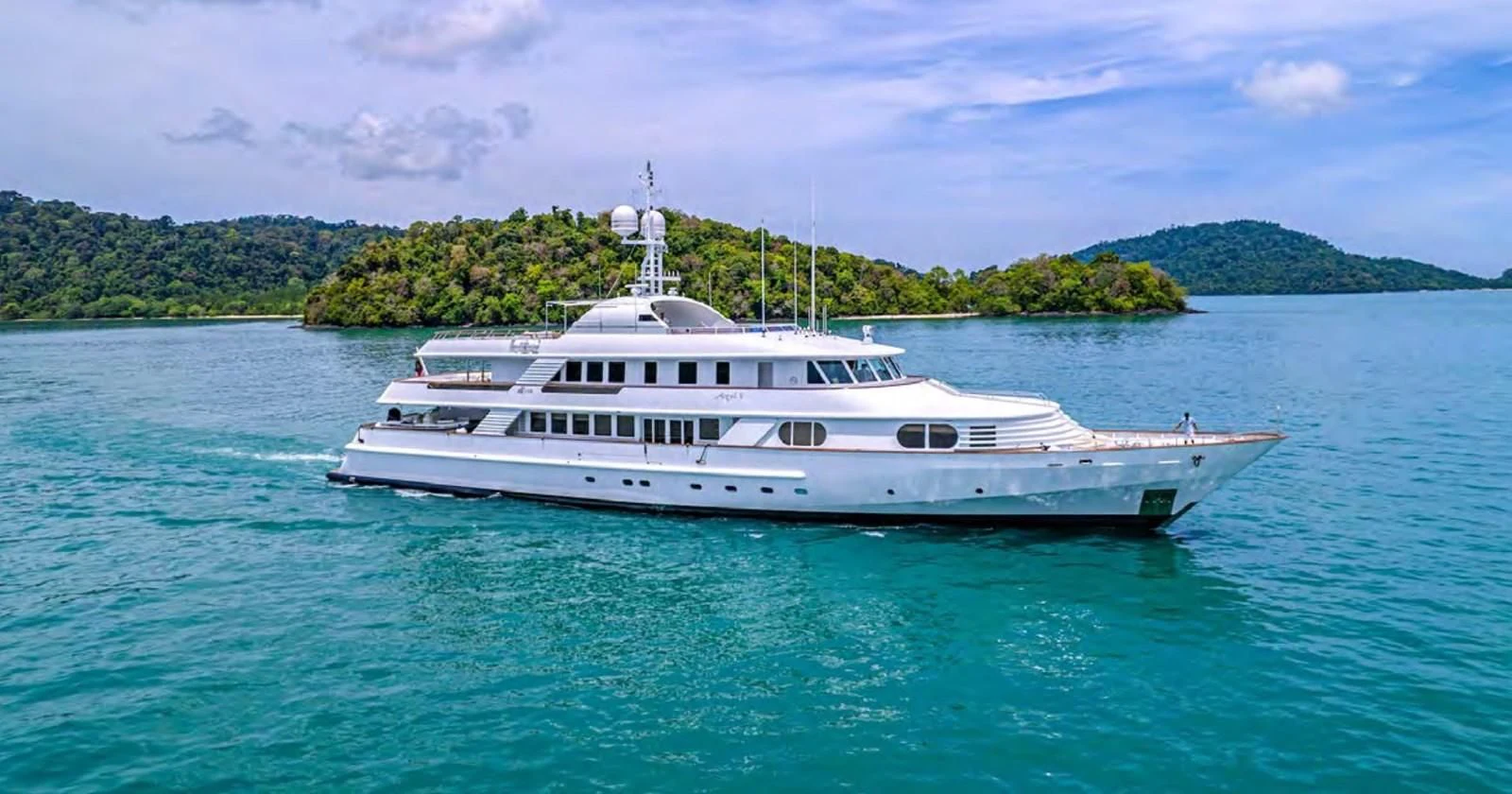 a white boat in the water aboard AZUL V Yacht for Charter