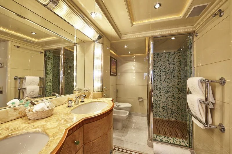 a bathroom with a sink and a shower aboard AZUL V Yacht for Charter