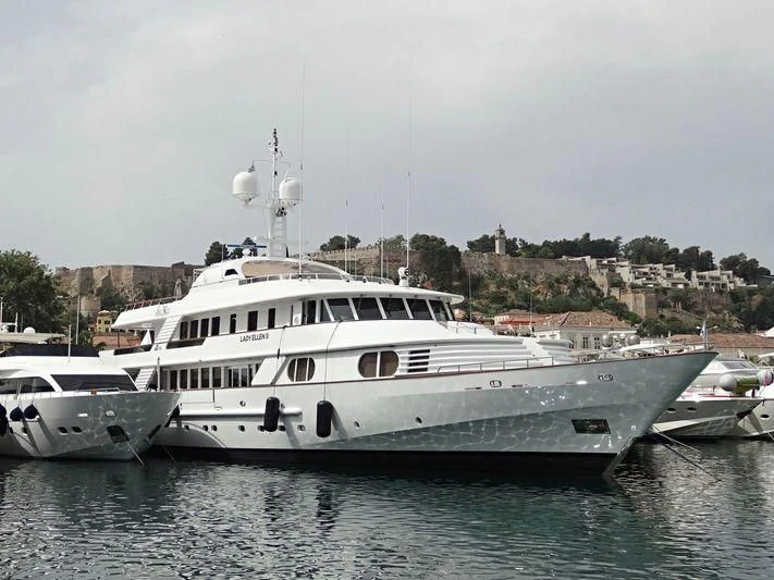 a large white boat in the water aboard AZUL V Yacht for Charter
