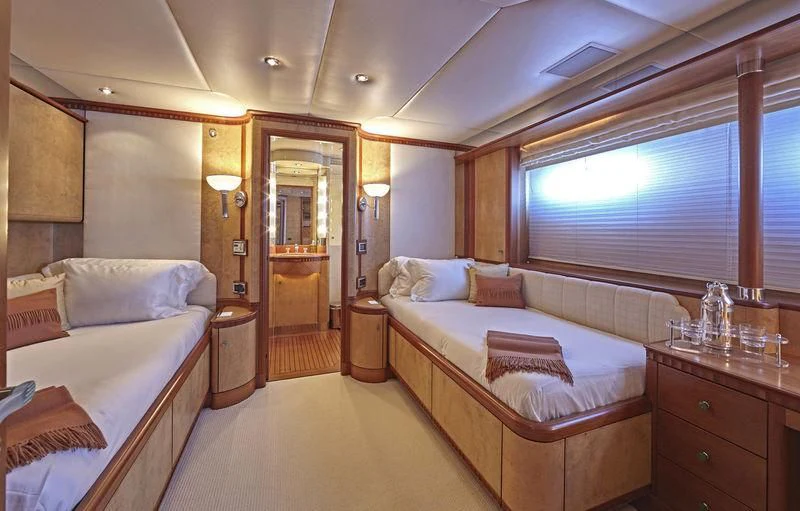 a room with two beds aboard AZUL V Yacht for Charter