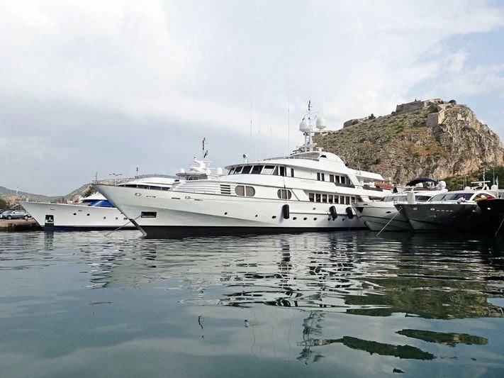 a group of boats in a body of water aboard AZUL V Yacht for Charter