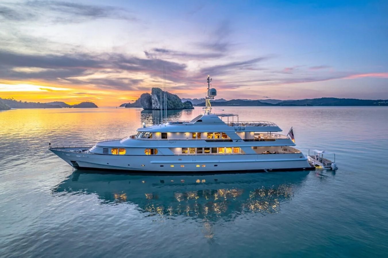 a large ship in the water aboard AZUL V Yacht for Charter