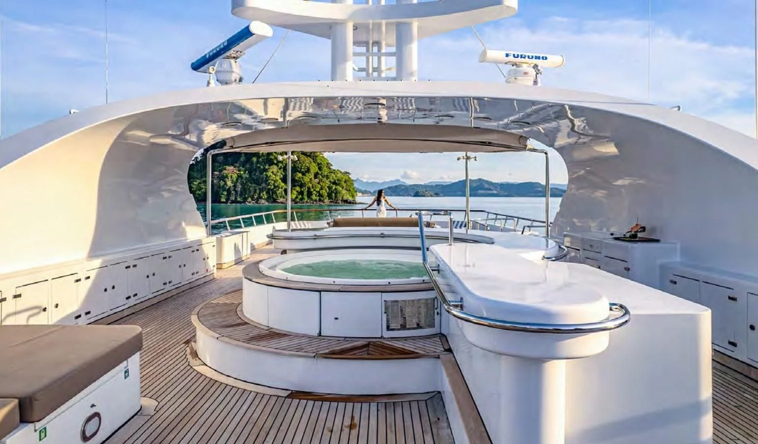 a room with a pool and a plane in the background aboard AZUL V Yacht for Charter