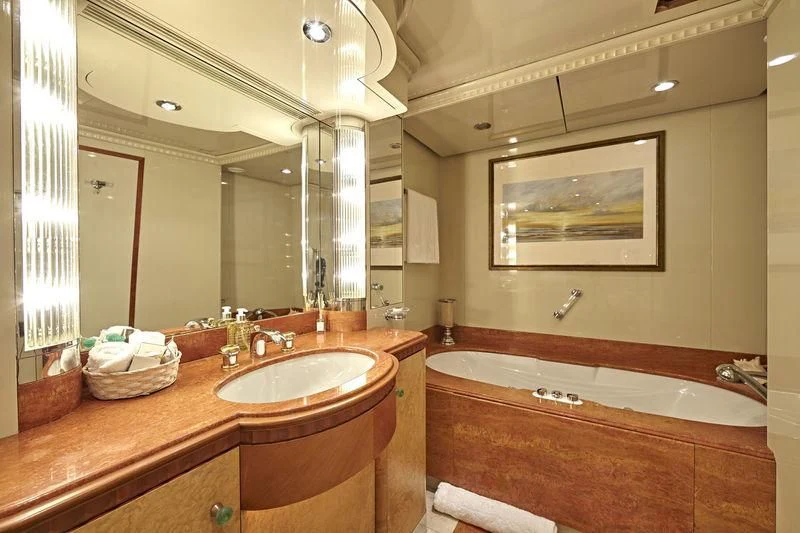 a bathroom with a large mirror aboard AZUL V Yacht for Charter