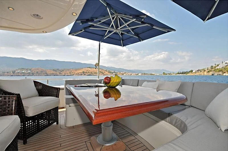 a table with fruit on it aboard M.T. TIME Yacht for Sale