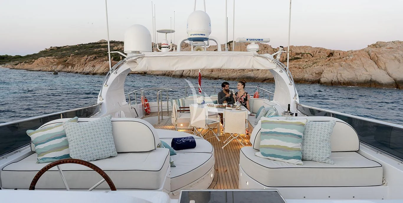 a couple of people on a boat aboard AMAYA Yacht for Sale