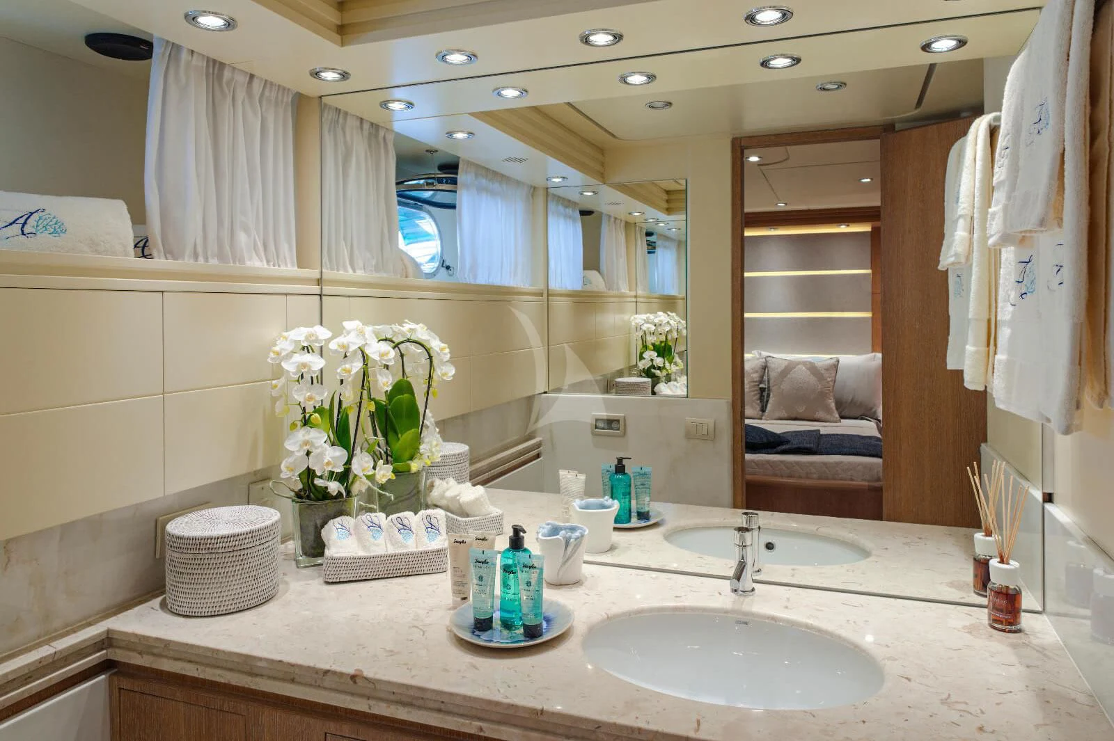 a bathroom with a large mirror aboard AMAYA Yacht for Sale