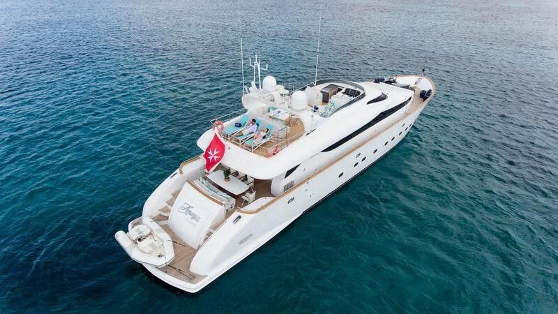 a white boat in the water aboard AMAYA Yacht for Sale