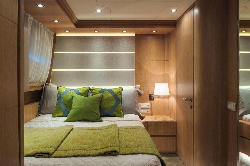 a bed in a room aboard AMAYA Yacht for Sale