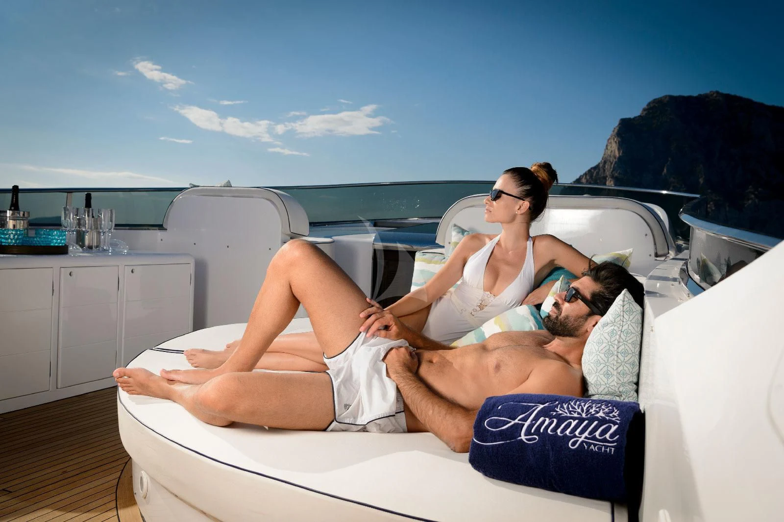 a group of people lying in a bathtub aboard AMAYA Yacht for Sale
