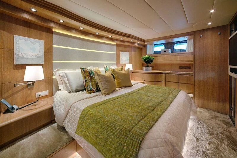 a bed in a room aboard AMAYA Yacht for Sale