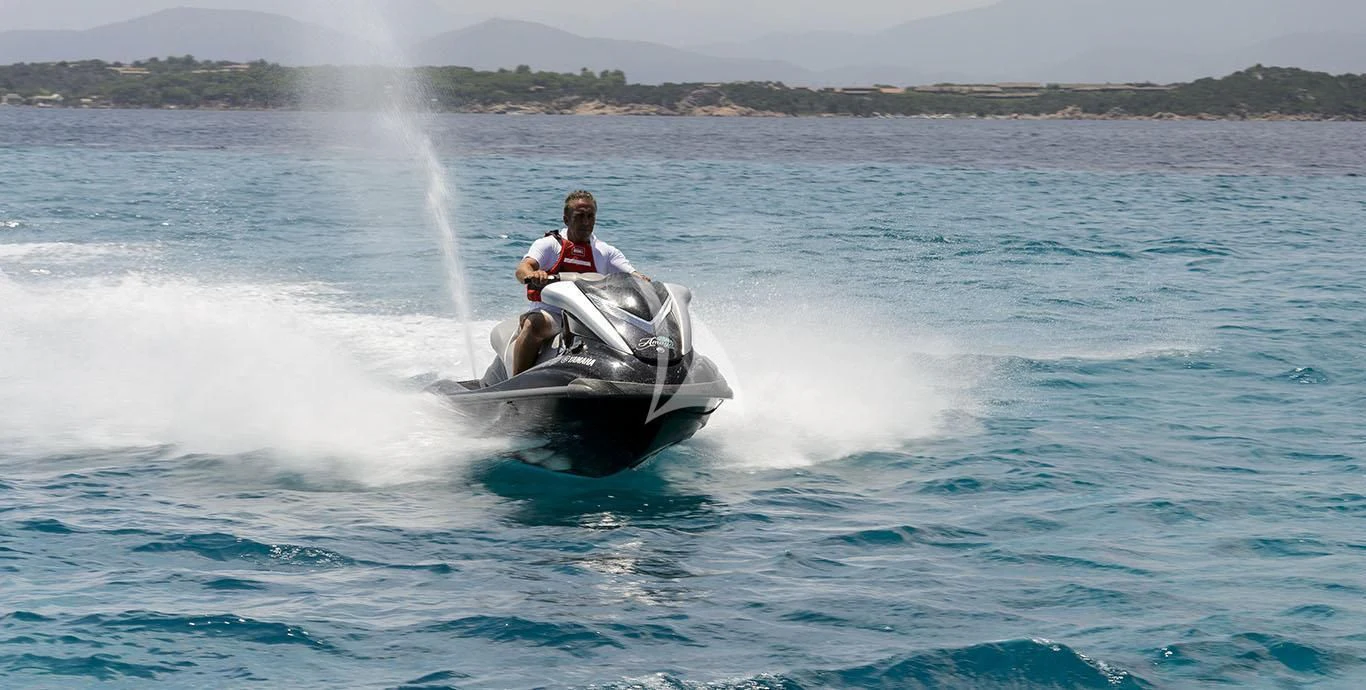 a man on a jet ski aboard AMAYA Yacht for Sale