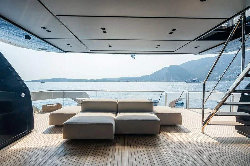 a room with a view of the ocean and mountains aboard PANAME Yacht for Sale