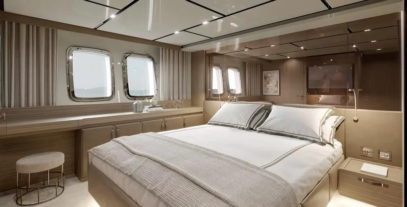 a room with a bed and a window aboard PANAME Yacht for Sale