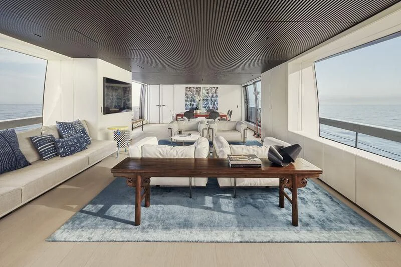 a person sitting at a table aboard PANAME Yacht for Sale