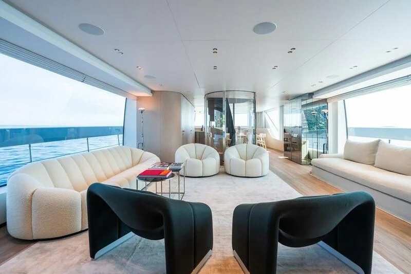 a living room with a large window aboard PANAME Yacht for Sale