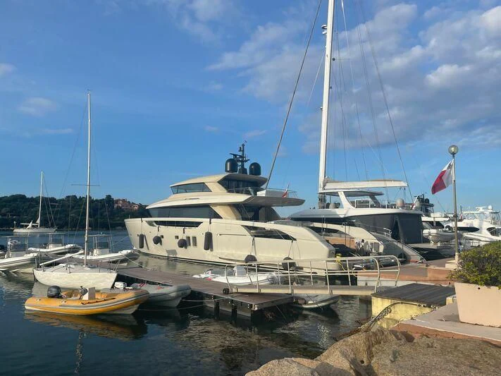 a boat docked at a pier aboard PANAME Yacht for Sale