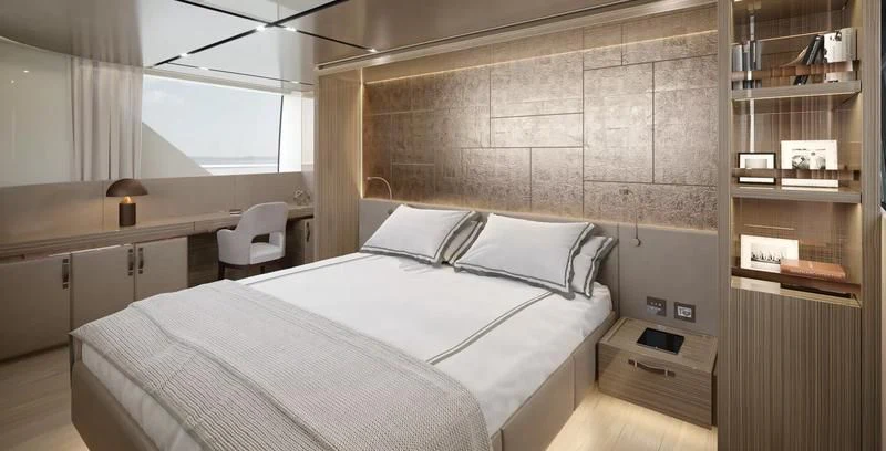 a room with a bed and a desk aboard PANAME Yacht for Sale