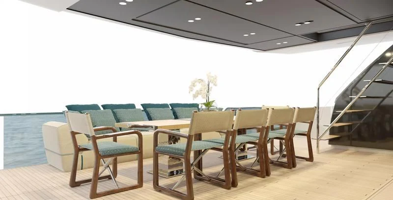 a room with tables and chairs aboard PANAME Yacht for Sale