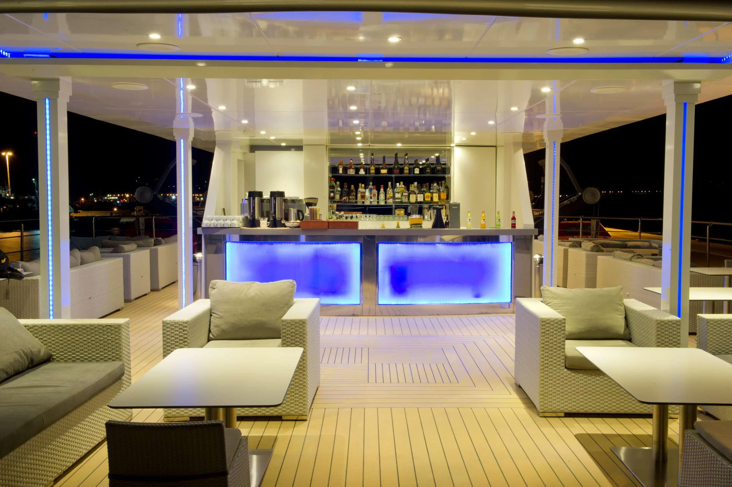 a room with a bar and a couch aboard VARIETY VOYAGER Yacht for Sale