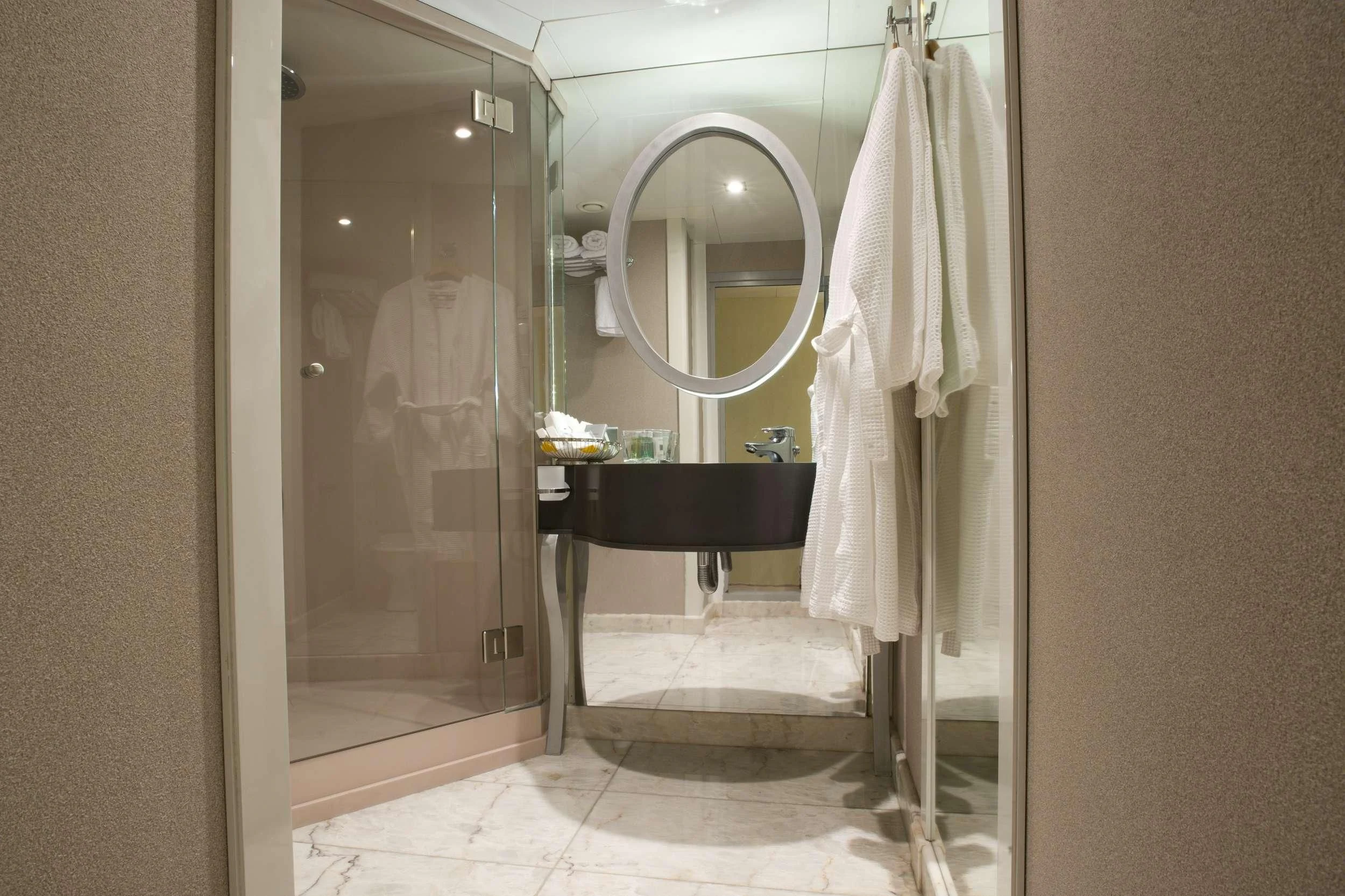 a bathroom with a large mirror aboard VARIETY VOYAGER Yacht for Sale