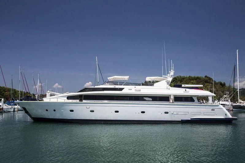 a white yacht in the water aboard GAMAYUN Yacht for Sale
