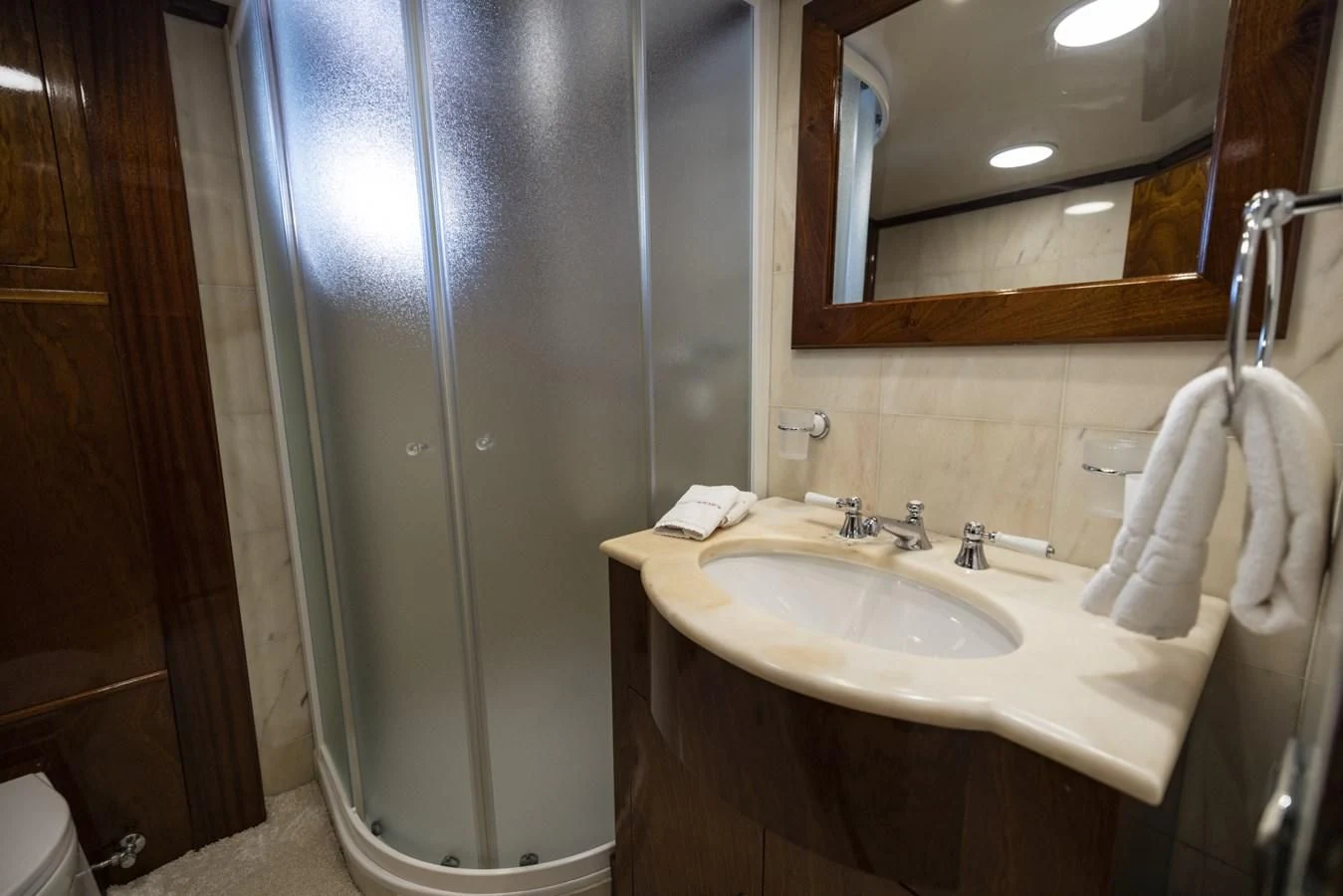 a bathroom with a sink and a mirror aboard FRANCESCO PETRARCA Yacht for Sale