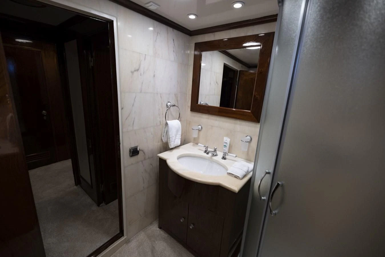 a bathroom with a sink and mirror aboard FRANCESCO PETRARCA Yacht for Sale