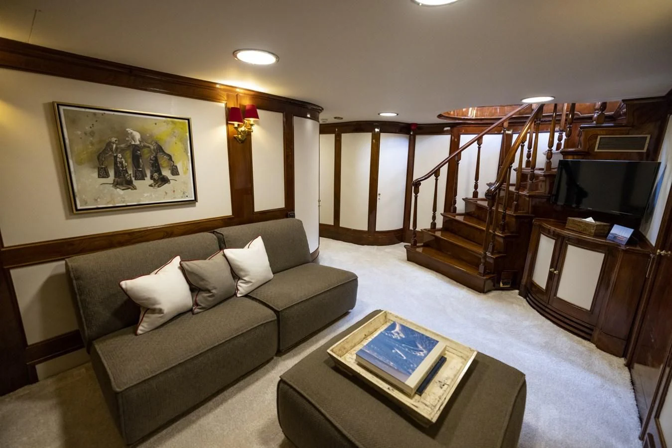 a living room with a couch and a coffee table aboard FRANCESCO PETRARCA Yacht for Sale
