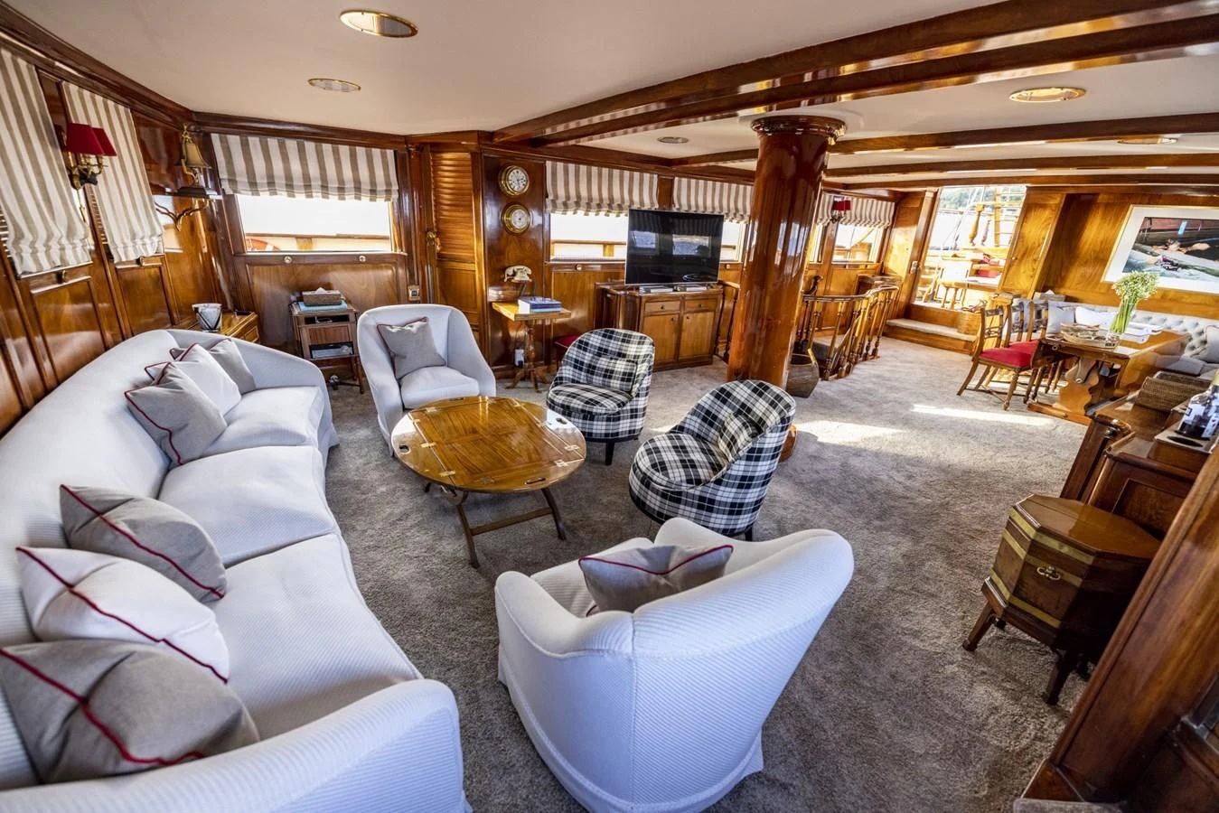 a living room with a large window aboard FRANCESCO PETRARCA Yacht for Sale